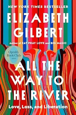Book cover of 'All the Way to the River' by Elizabeth Gilbert with colorful, swirling stripes in red, orange, yellow, green, blue, and white. Text highlights it's a New York Times bestseller, mentions Oprah's Book Club, and describes the book's themes of love, loss, and liberation.