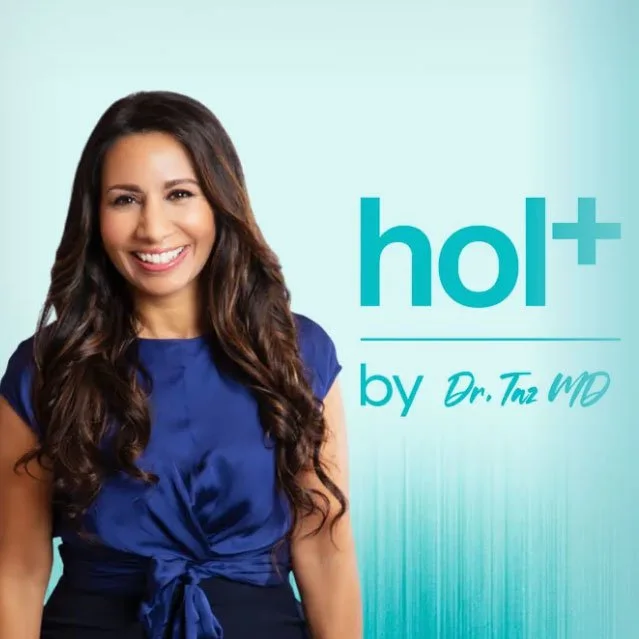 A woman with long dark hair smiling, wearing a blue top, standing next to a sign that reads 'holt+ by Dr. Taz MD' with a light blue background.