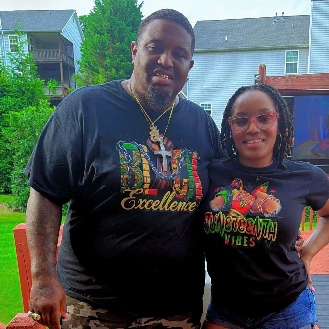 PurePress Wholesale owner and customer wearing custom printed T-shirts outdoors