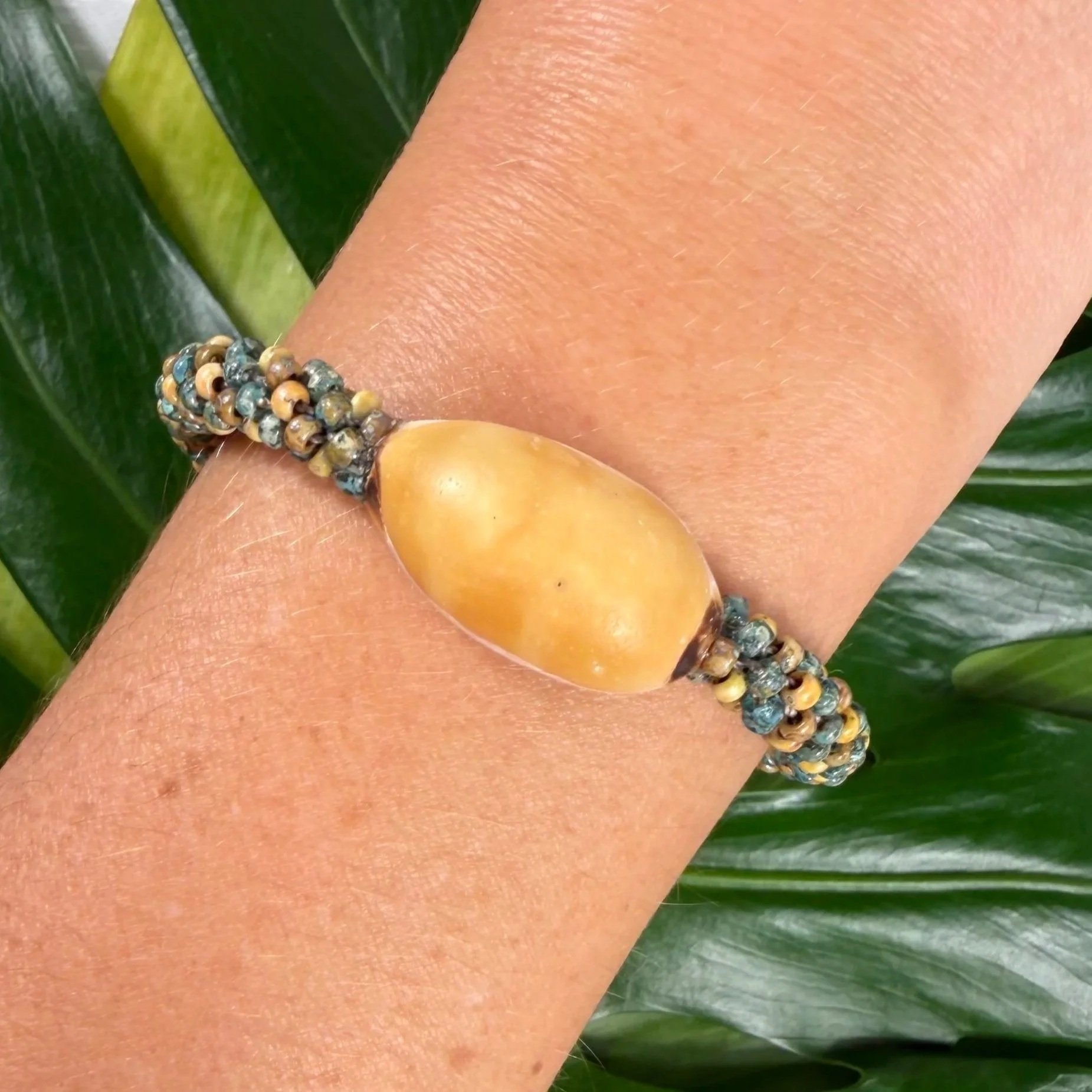 COWRIE%2BTEAL%2BWRIST.jpg