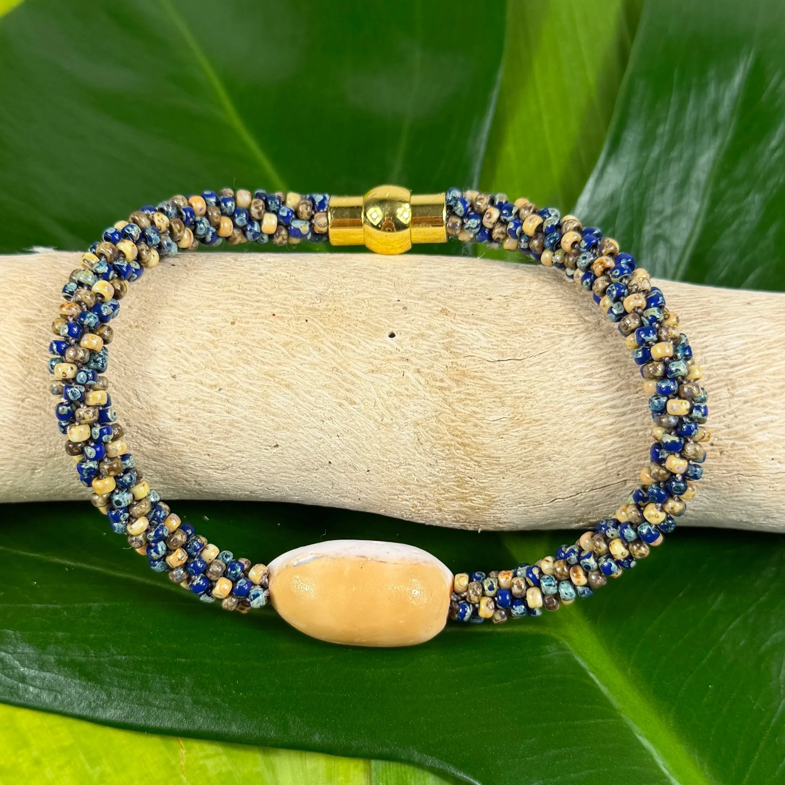 Cowrie+Shell+with+Blue+Spiral+.jpg