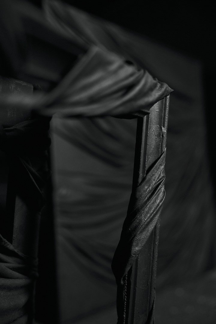 A close up of sculptural painting, I N : MO : P O.