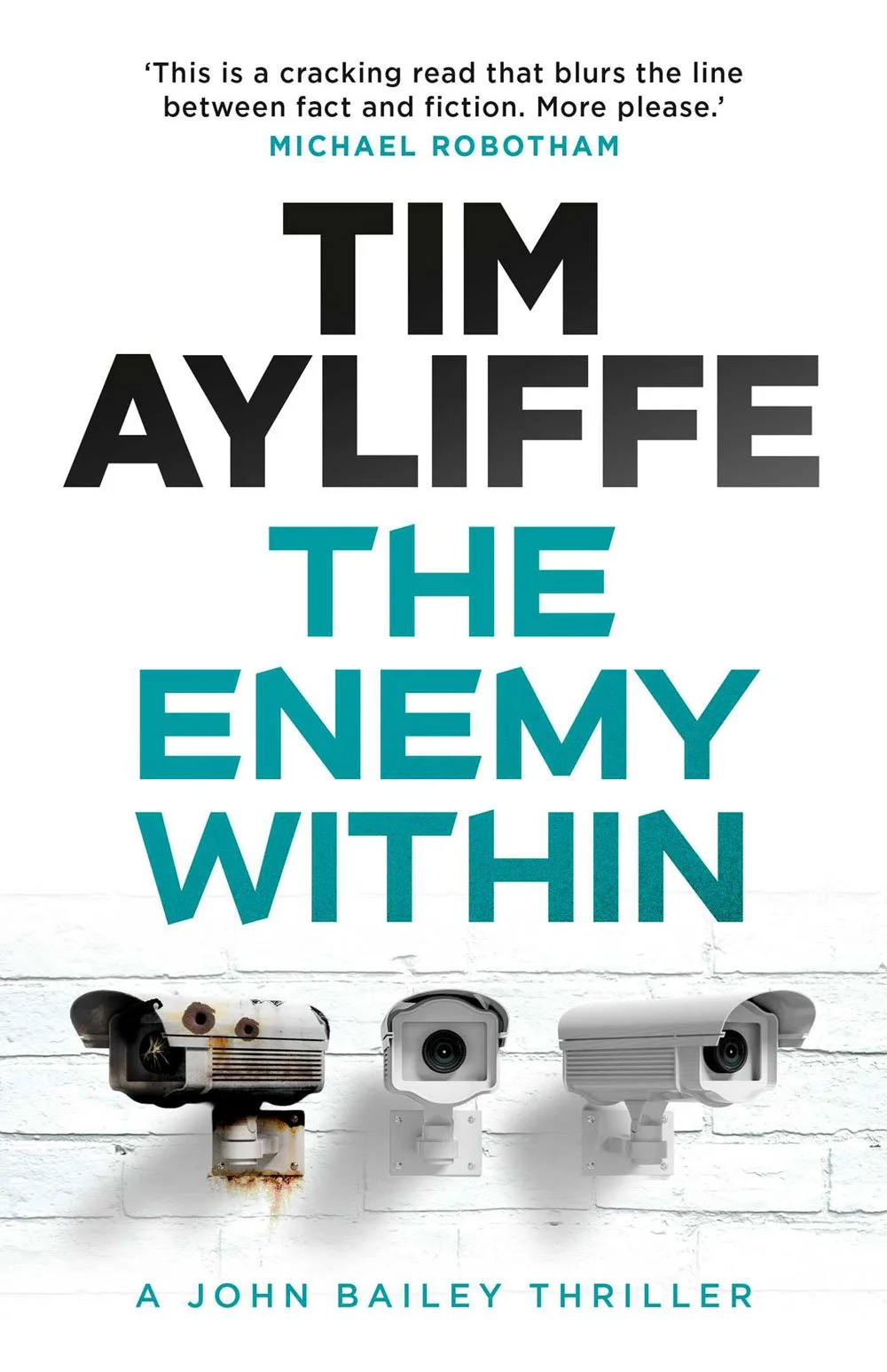 Book cover for 'The Enemy Within' by Tim Ayliffe featuring three security cameras mounted on a white brick wall.