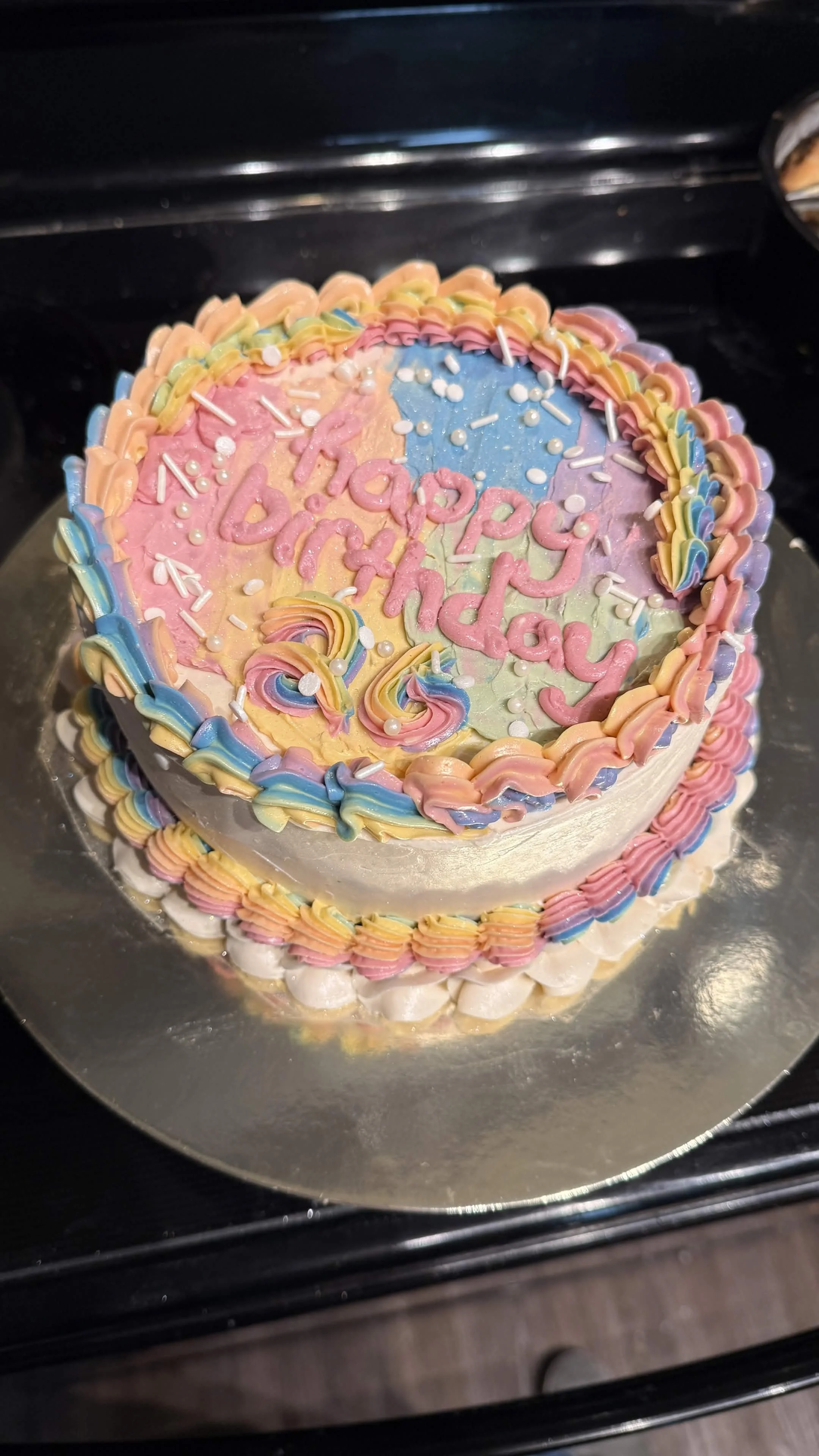 Rainbow paint smear birthday cake