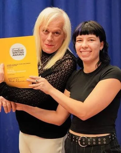 A photo of myself receiving the award from the lovely representatives at Seahorse Victoria, 2025. Photography: Josh Dean
