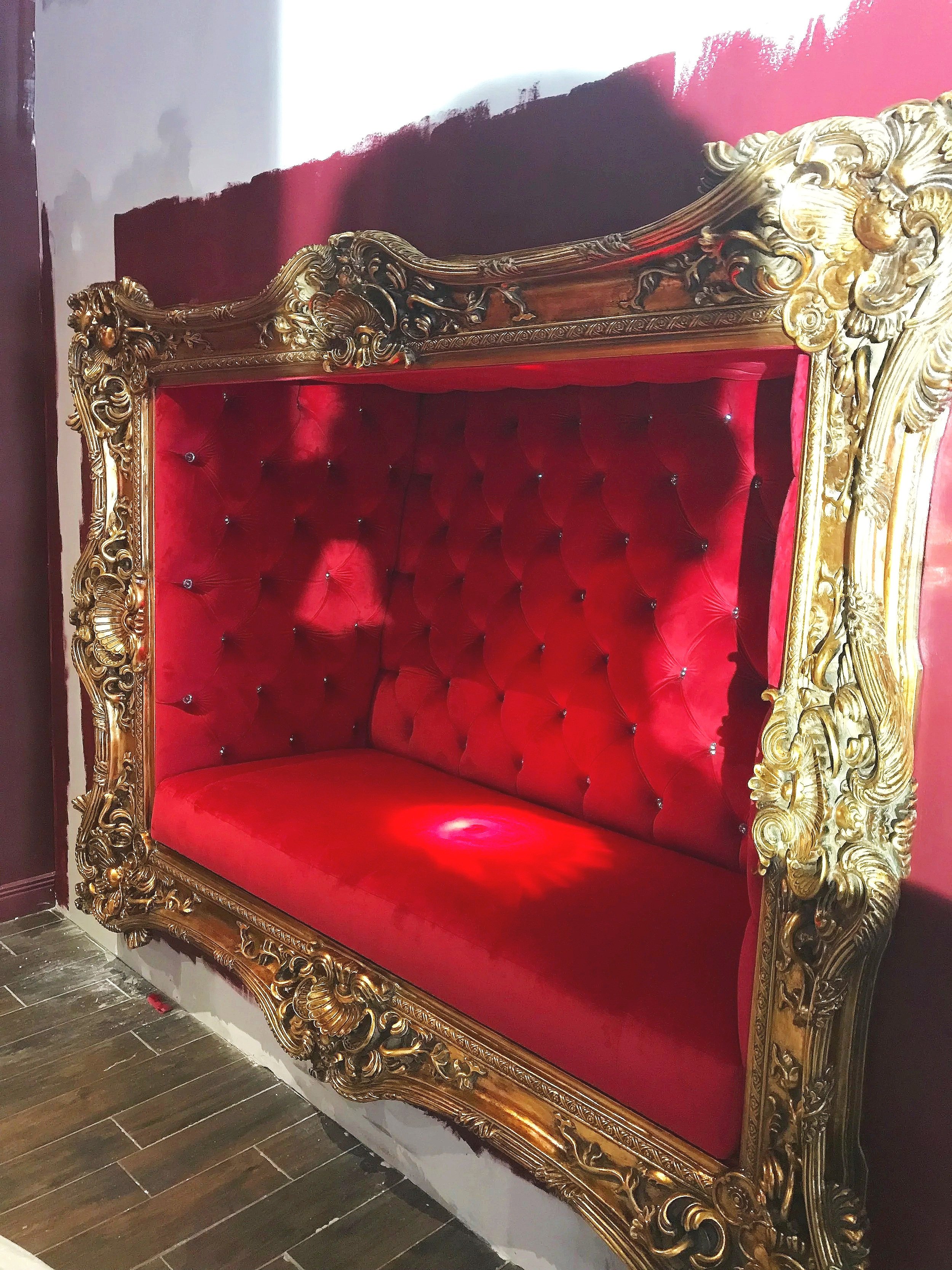 Luxury velvet sofa with custom wood detailing
