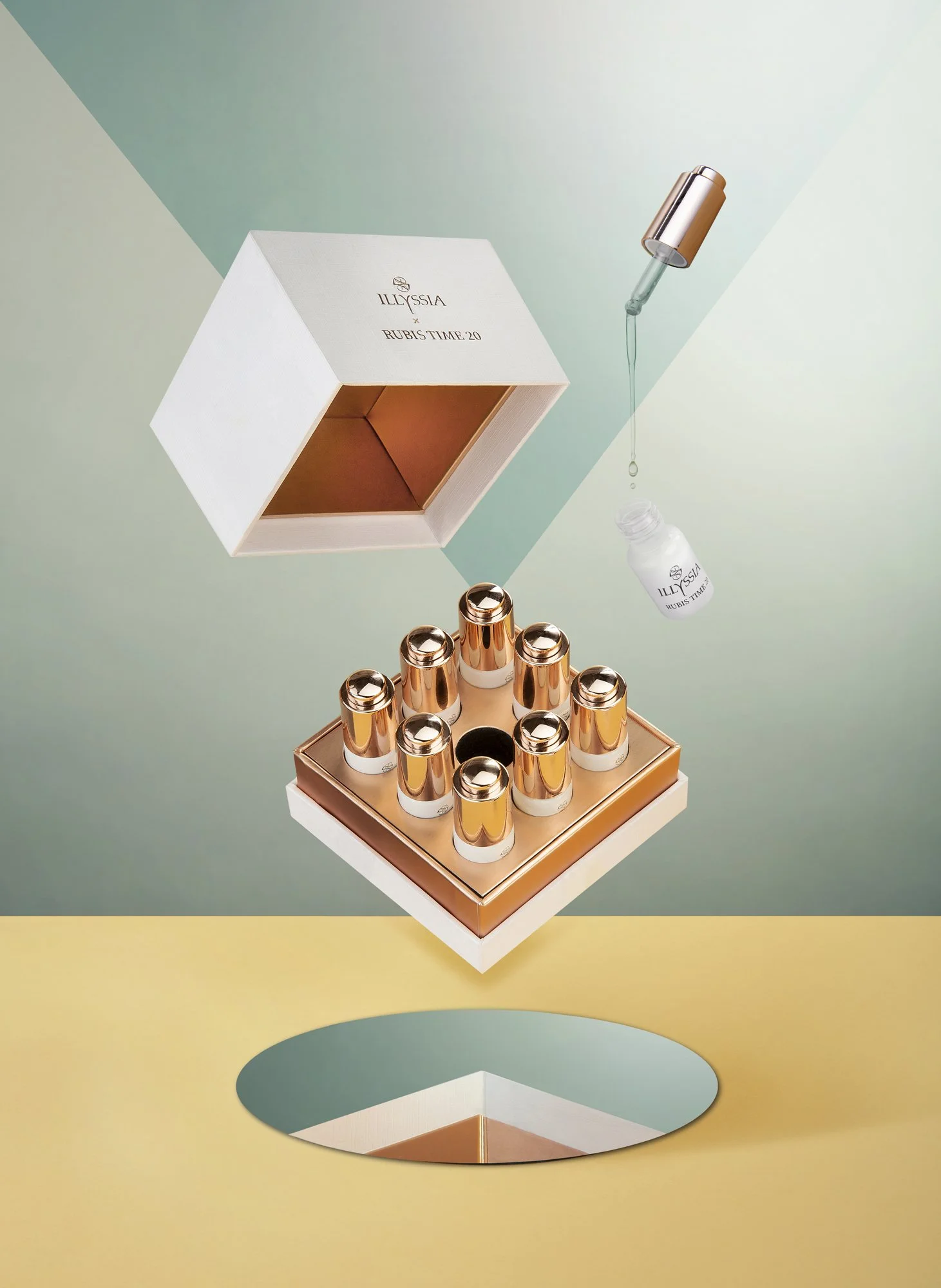 Set de petits flacons avec bouchons gold sur un plateau dans un style élégant et moderne, avec une boîte blanche ornée de texte.