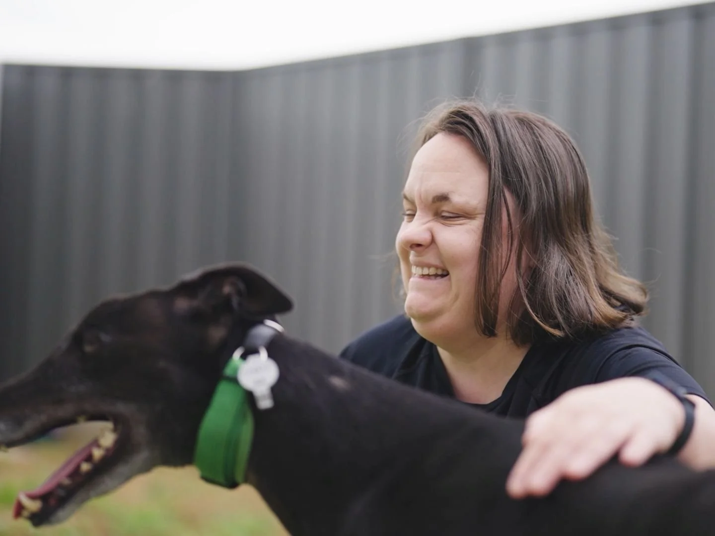 Woman and greyhound