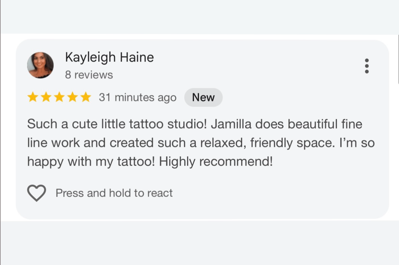 A positive online review by Kayleigh Haine for a tattoo studio, praising Jamilla's fine line work and friendly atmosphere.