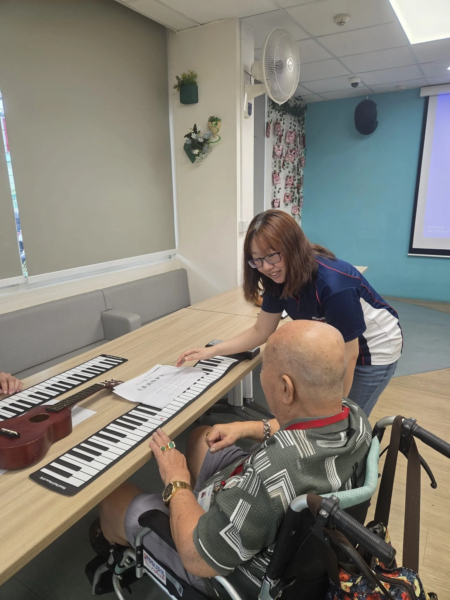 CEE Team conducting Keyboard Workshop @  NTUC Health Senior Day Care