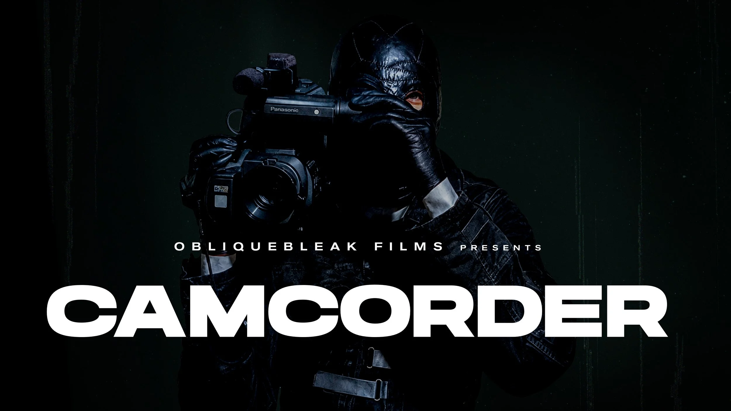 Dark image of a person in black clothing and a black leather mask, holding a camera to their eye, with the words 'OBLIQUELEAK FILMS presents CAMCORDER' at the bottom.