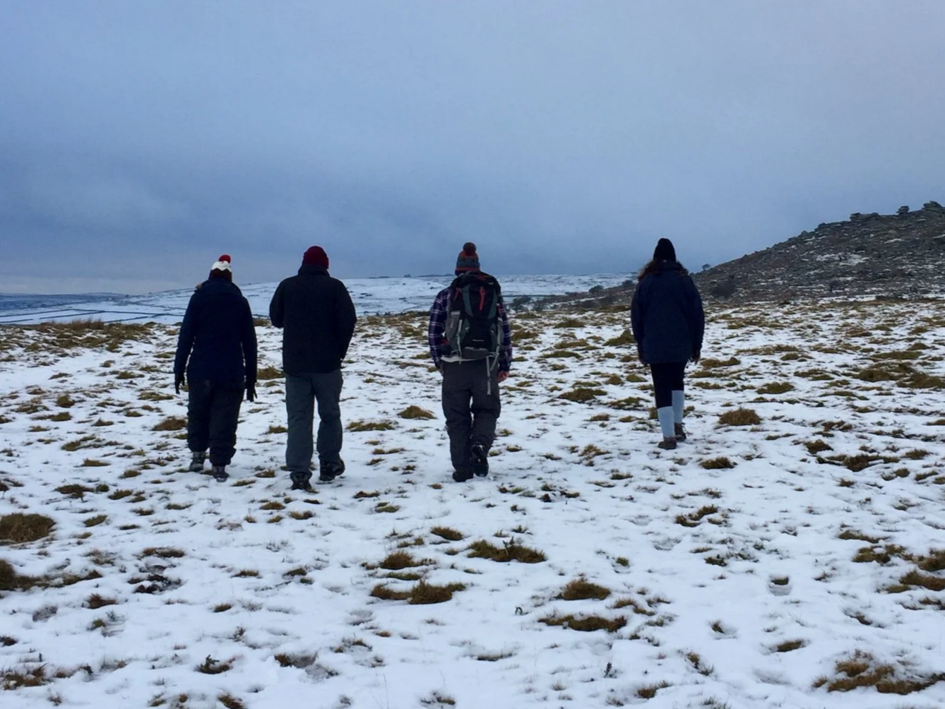 Calum leading a hike on Bodmin Moor in the snow