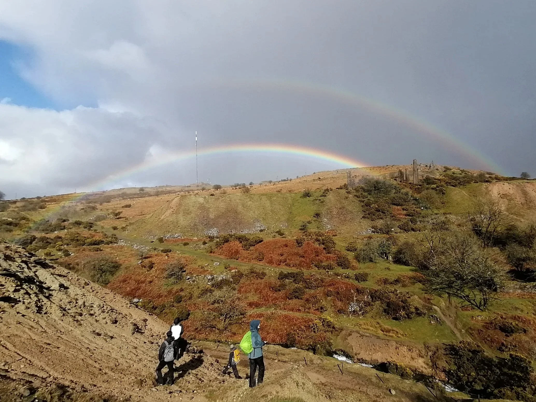 A group of geology students studying the minerals at South Caradon Mine near Minions on Bodmin Moor.