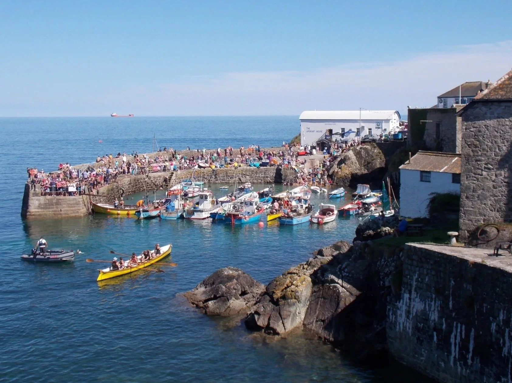 The bustling harbour scene at Coverack during their annual regatta.