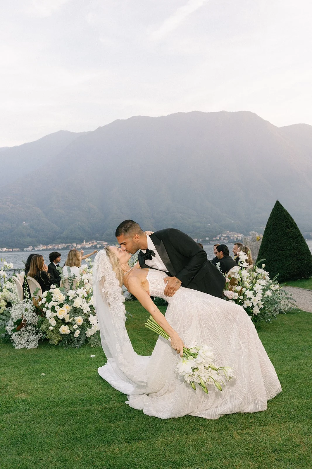 bride and groom kissing after the wedding ceremony in villa balbiano 