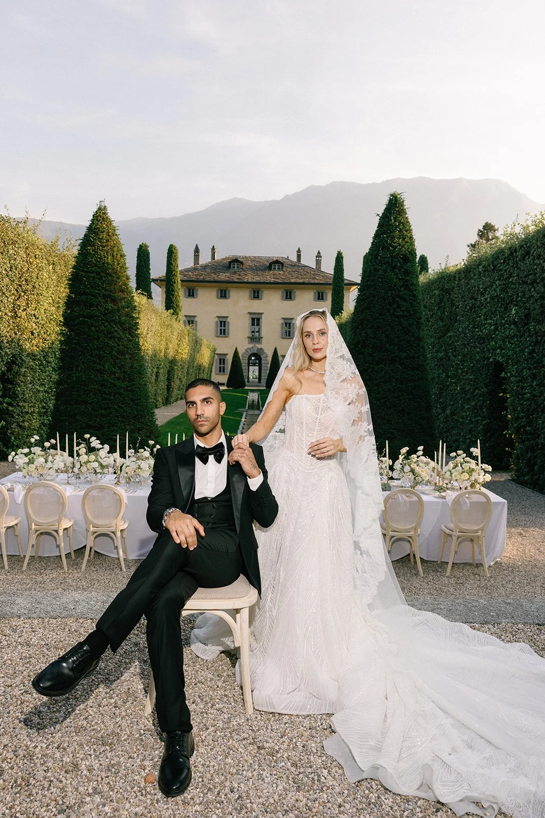 bride and groom editorial in front of villa balbiano in lake como