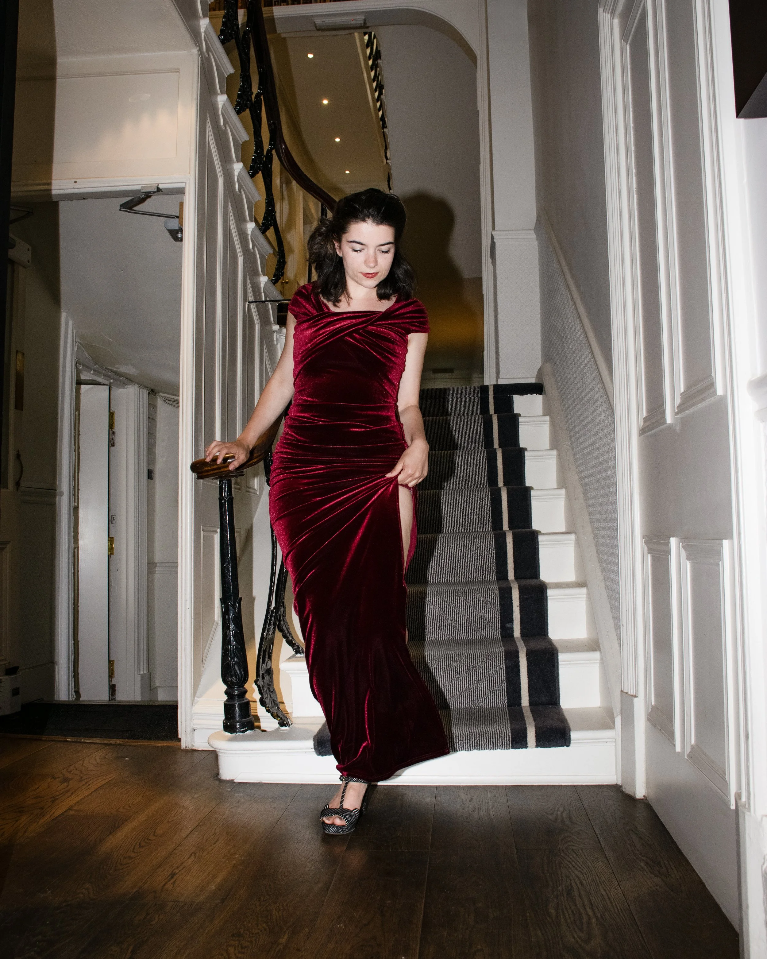 Boutique elegant hotel customer red dress photography.jpg