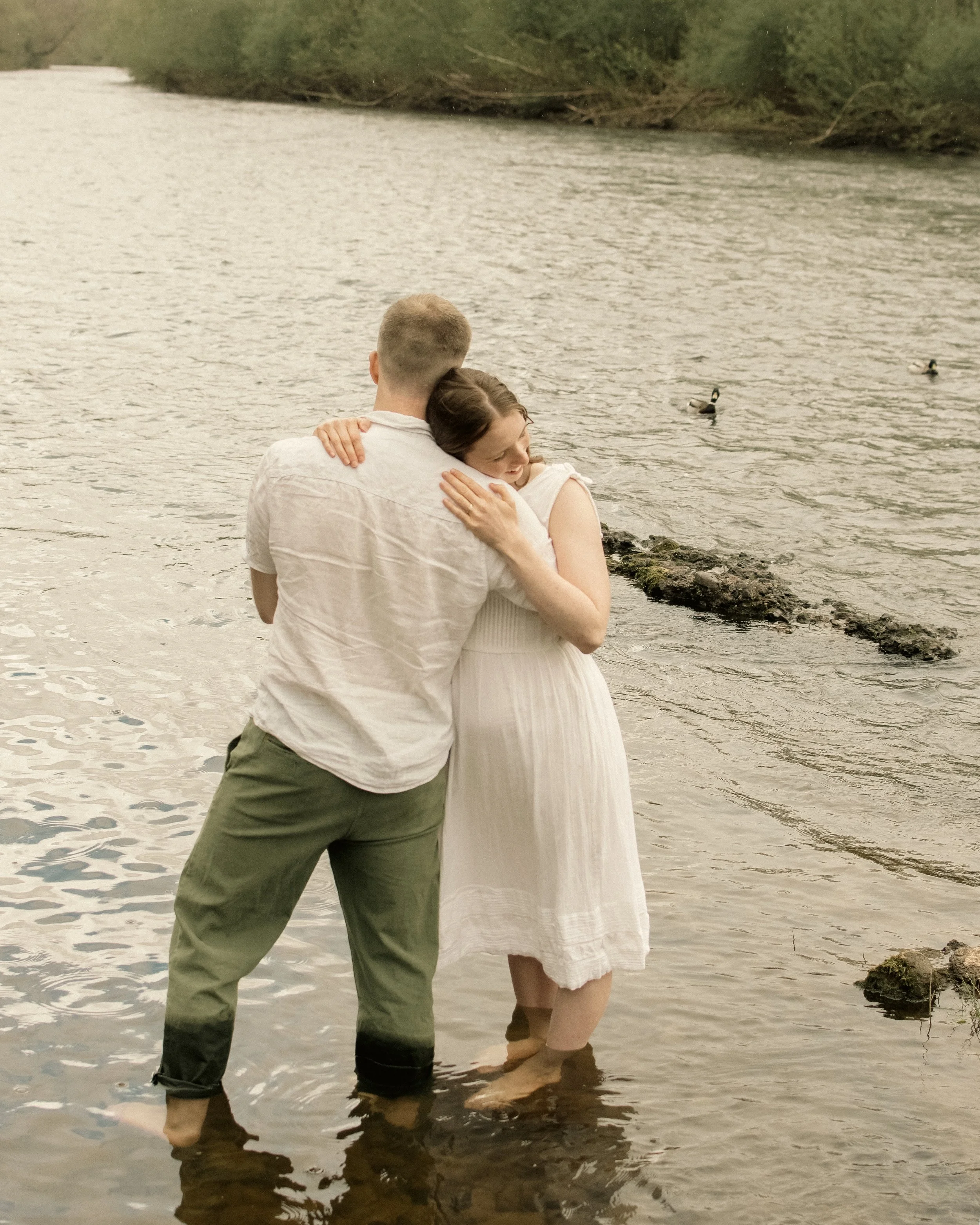 documentary romantic candid couple engagement photography water river.jpg