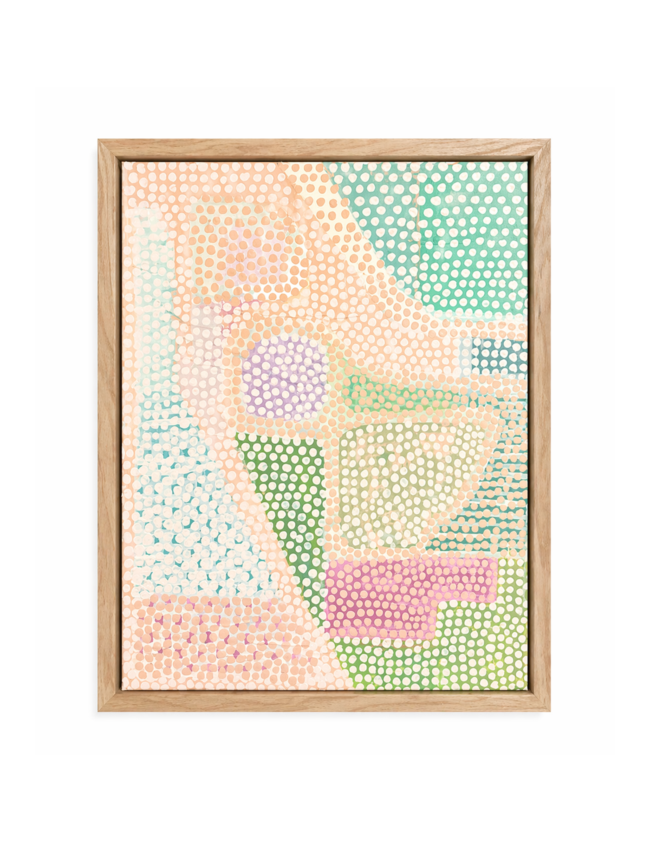 Close-up view of a colorful abstract mosaic artwork contained within a wooden frame, featuring a pattern of polka dots and geometric shapes in pastel colors.