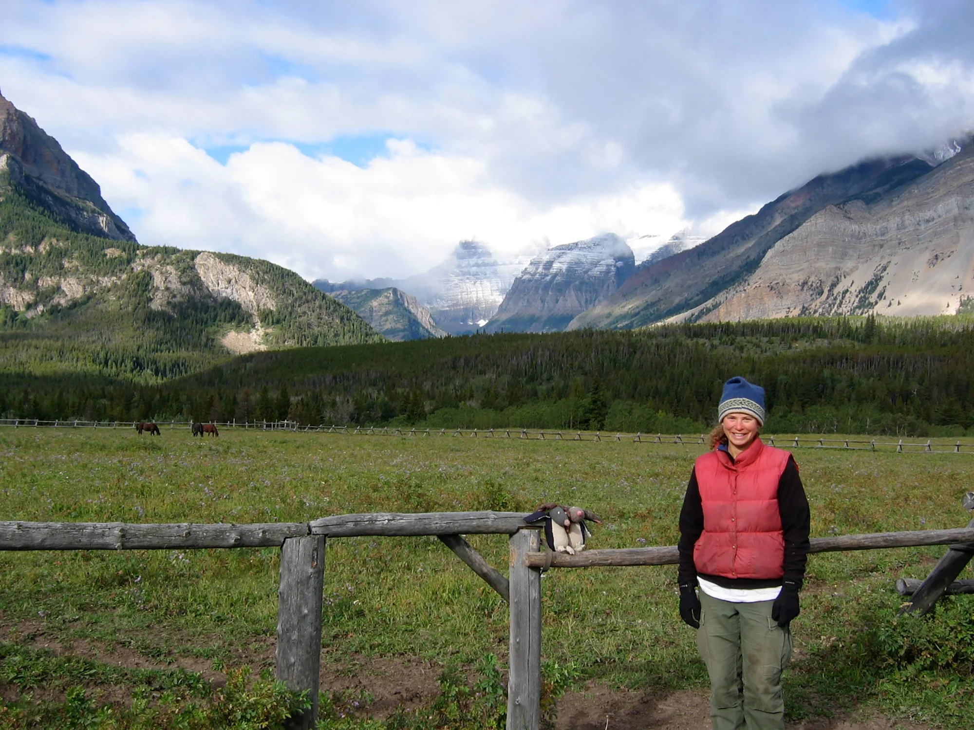 Owner in front of mountain