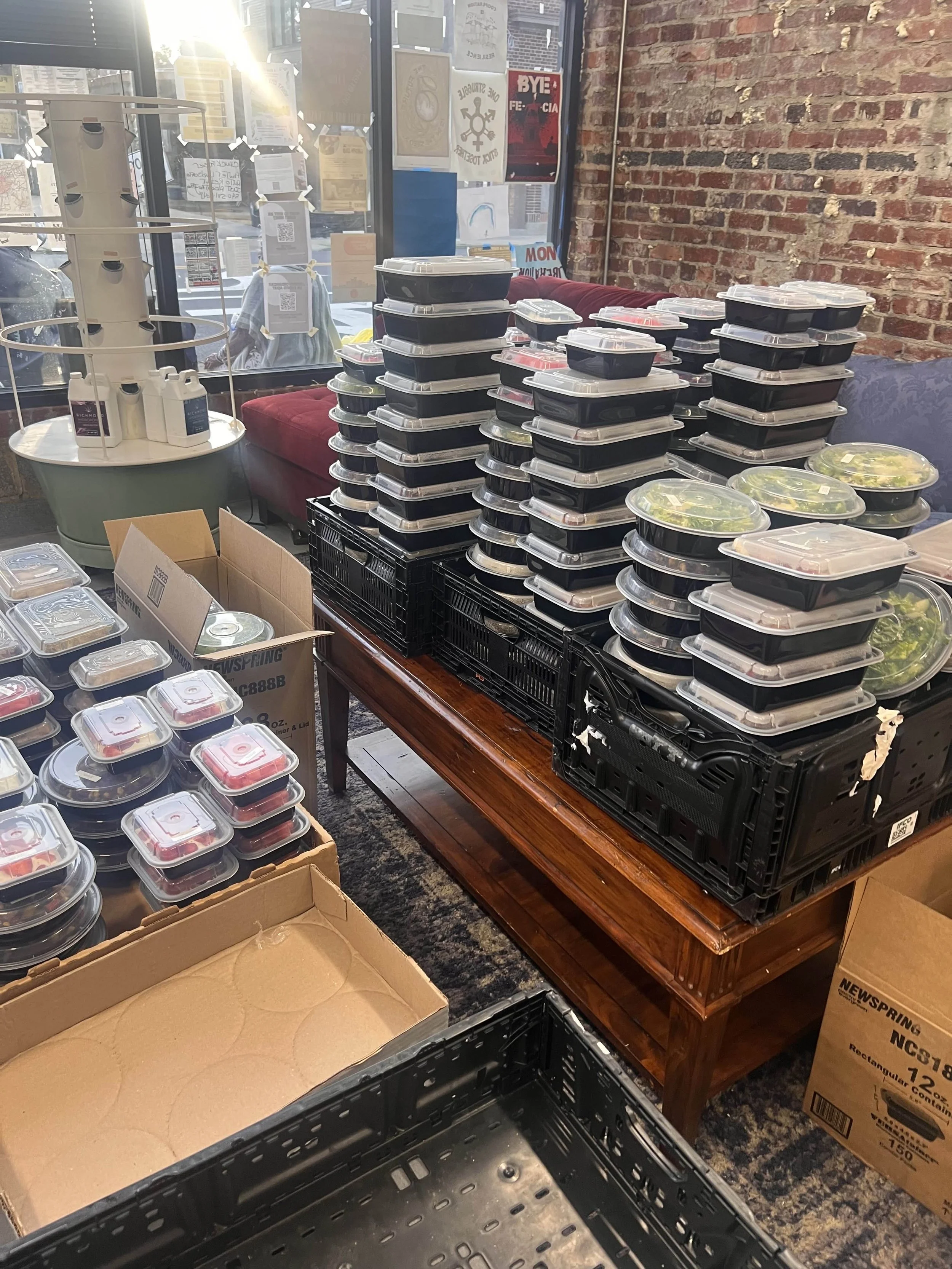 stacks of prepared meals ready to go out to the community