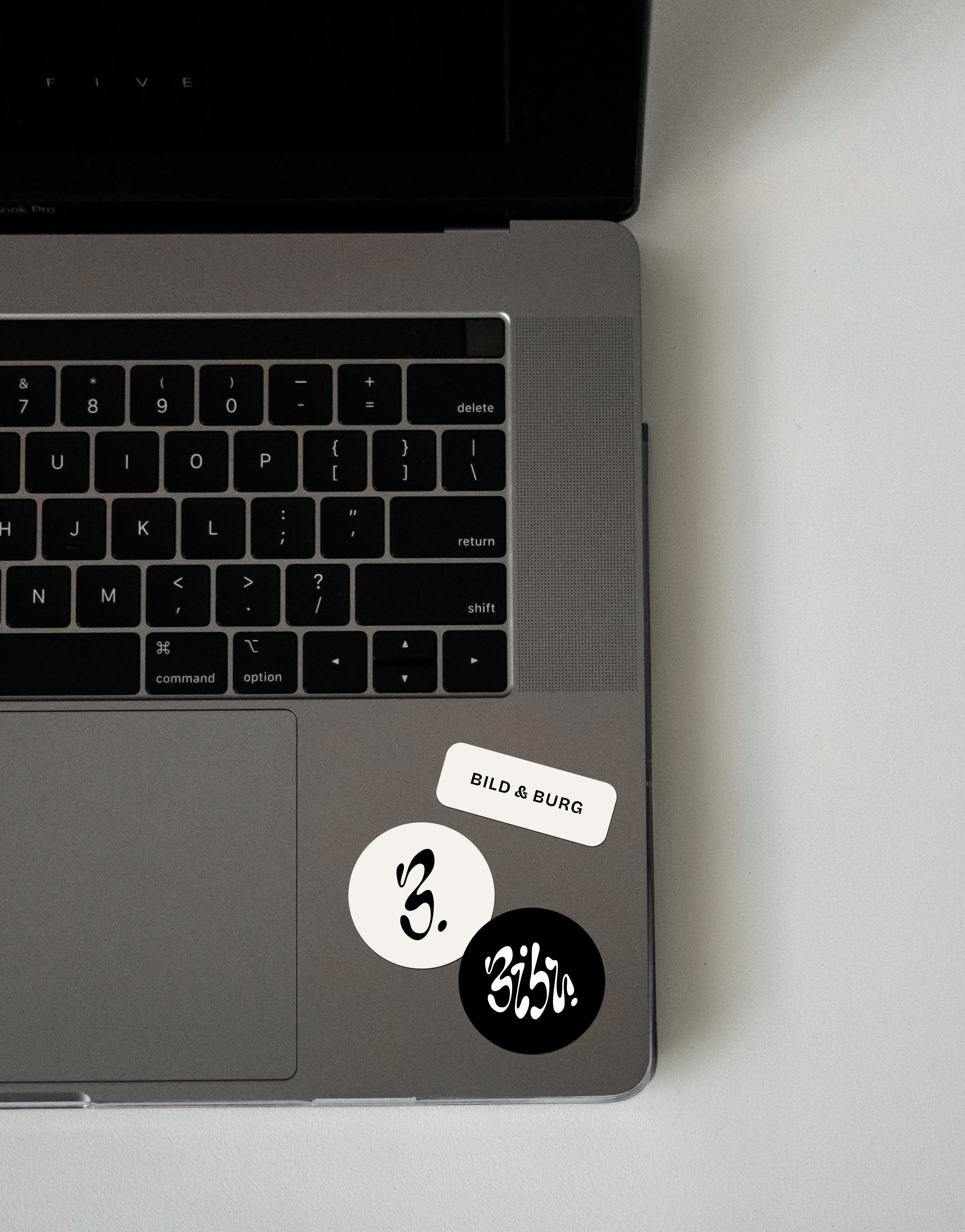 Sticker on Laptop Mockup.png