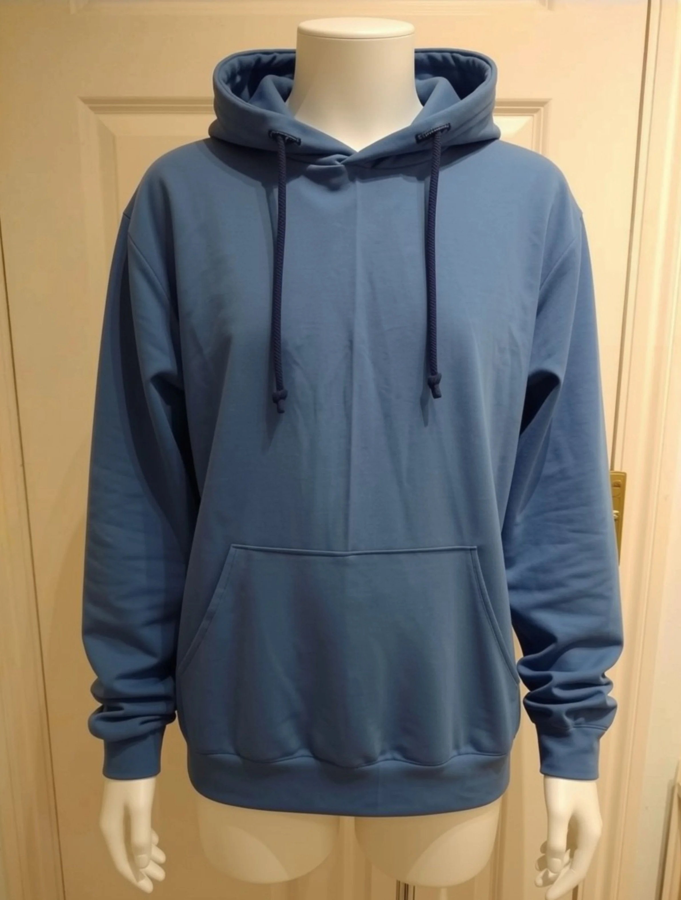 Blue hoodie with drawstrings displayed on a mannequin.