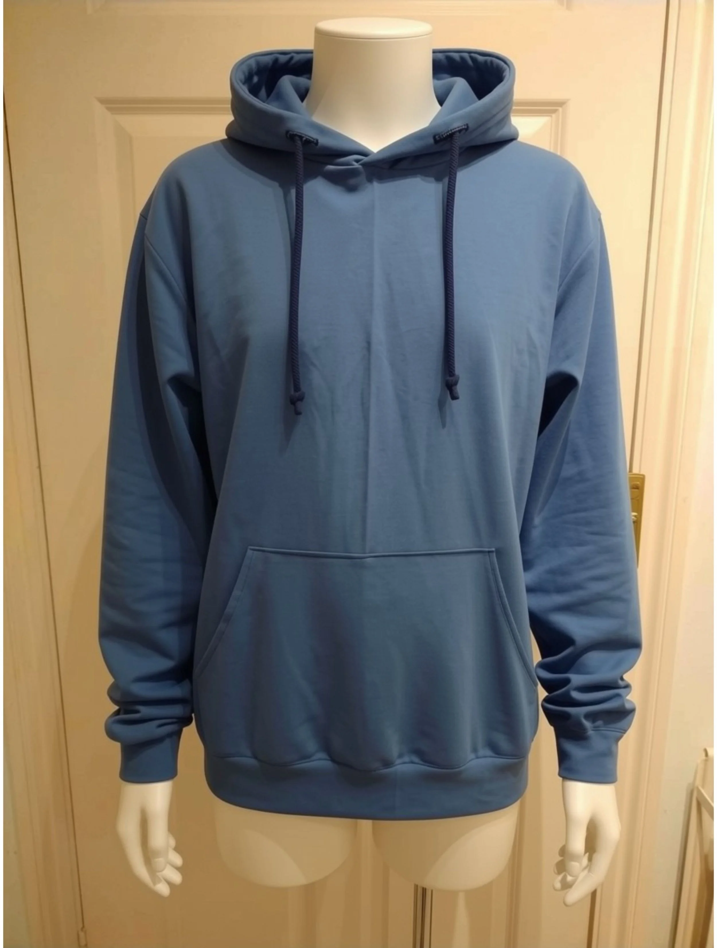 Blue hoodie displayed on a mannequin with a plain background.