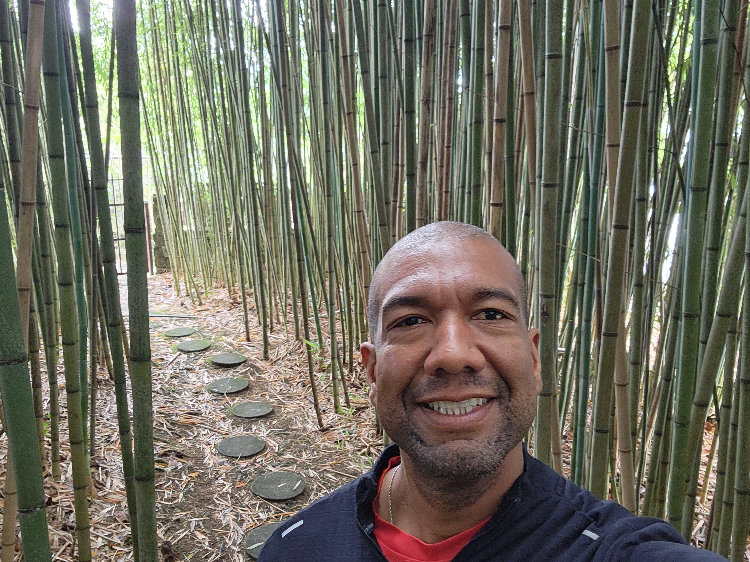 Leal smiling in a bamboo forest