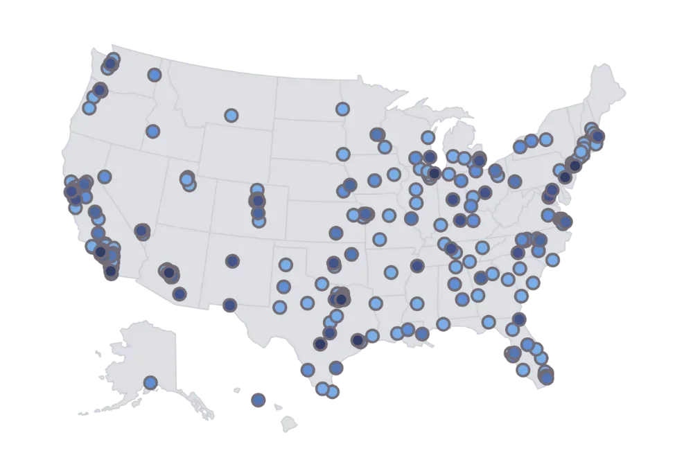 A map of the United States showing multiple blue dots scattered across various states, indicating locations or data points.