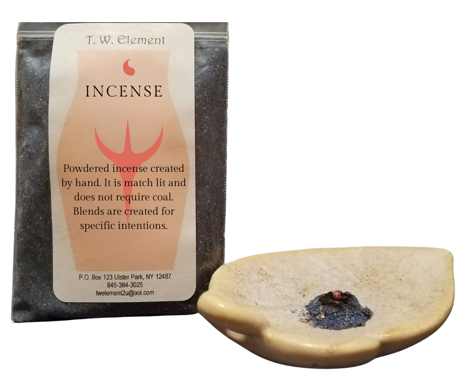 A packet of T.W. Element incense with a red flame logo and a small ceramic dish containing a burned incense ember.