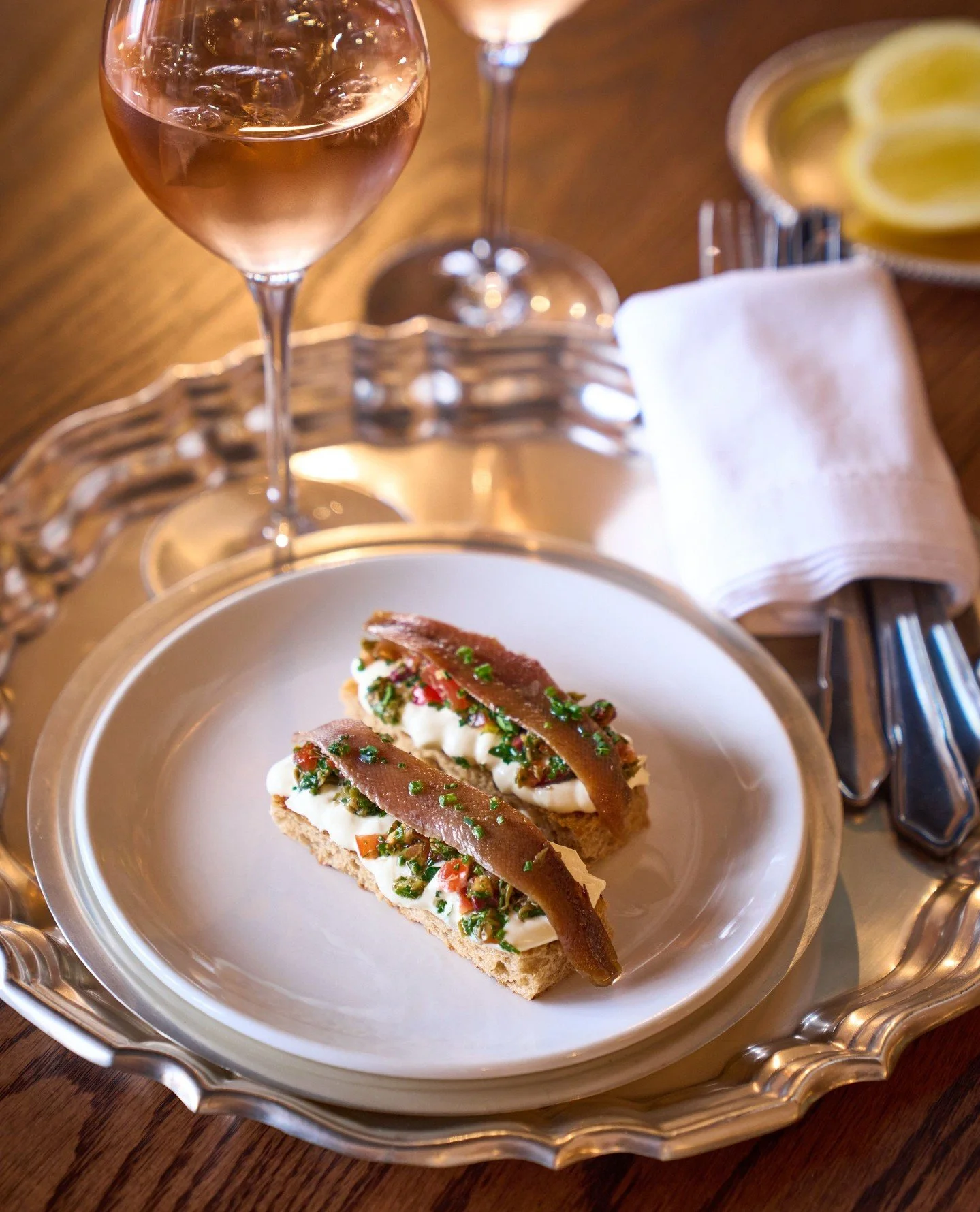 Pair with a glass of crisp white for a sophisticated start to your evening with us. Anchovy Toasts. Cantabrian anchovy fillets, cr&egrave;me fra&icirc;che, sourdough, sauce vierge.⁠
⁠
#starters #dinnermenu #leparc⁠