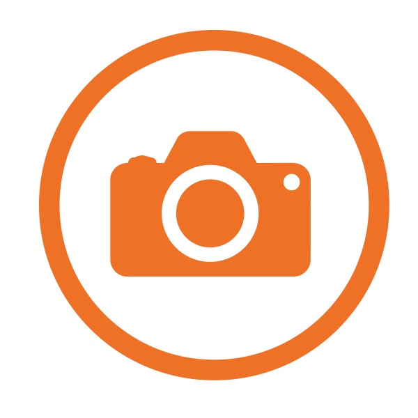 Placeholder image with an orange camera icon inside an orange circle on a white background.