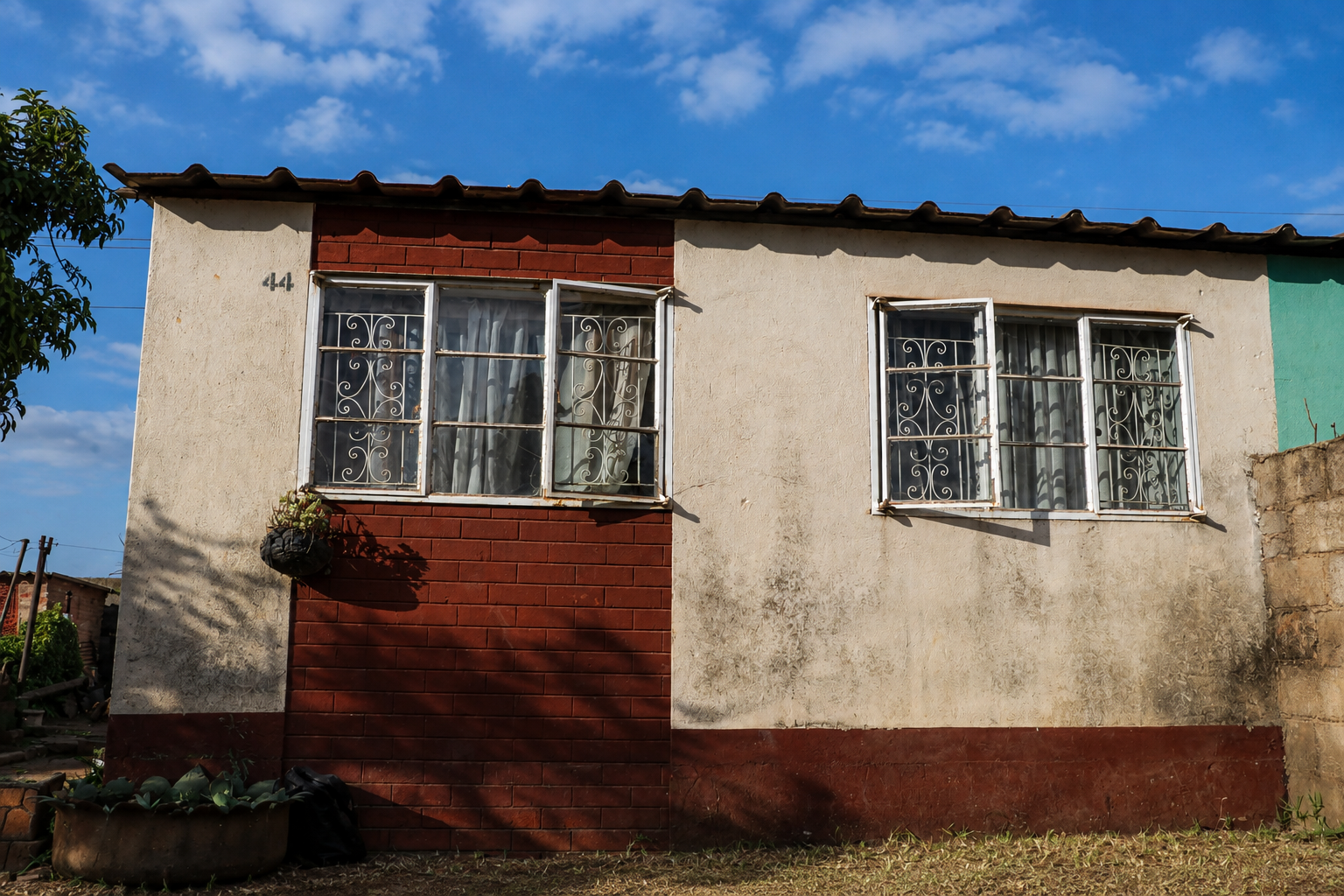 " When we were groing up, we were ashamed of our Malawian heritage as we did not have rural homes so our parents bought the houses that we now live in." © Angela Jimu