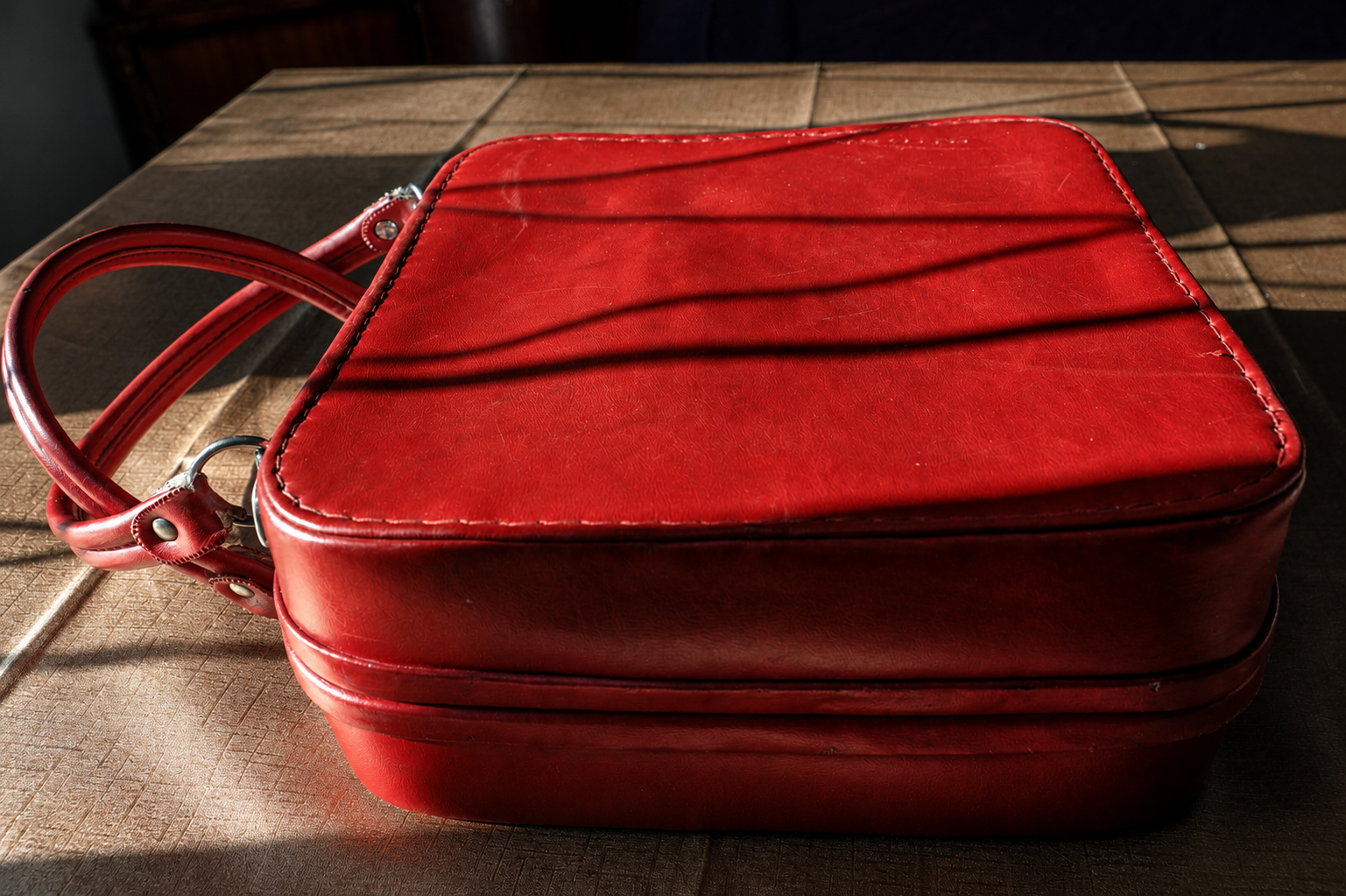 "I returned to Zimbabwe in 1980 after years of studying in Malawi. I carried this bag when I was returning and we have kept it in the family all these years." © Angela Jimu
