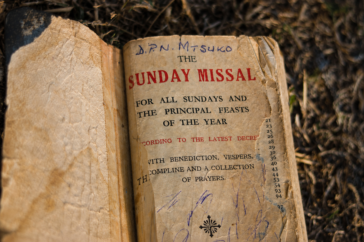 "I inherited this book when they were distributing my father's things after his funeral." © Angela Jimu