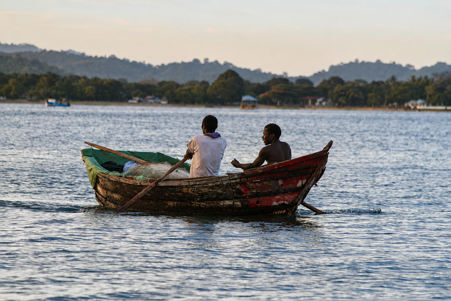 "My mother was from Mangochi District. I have never been to Malawi." Fishermen are seen on Lake Malawi in Mangochi district in the early hours of the morning. © Angela Jimu