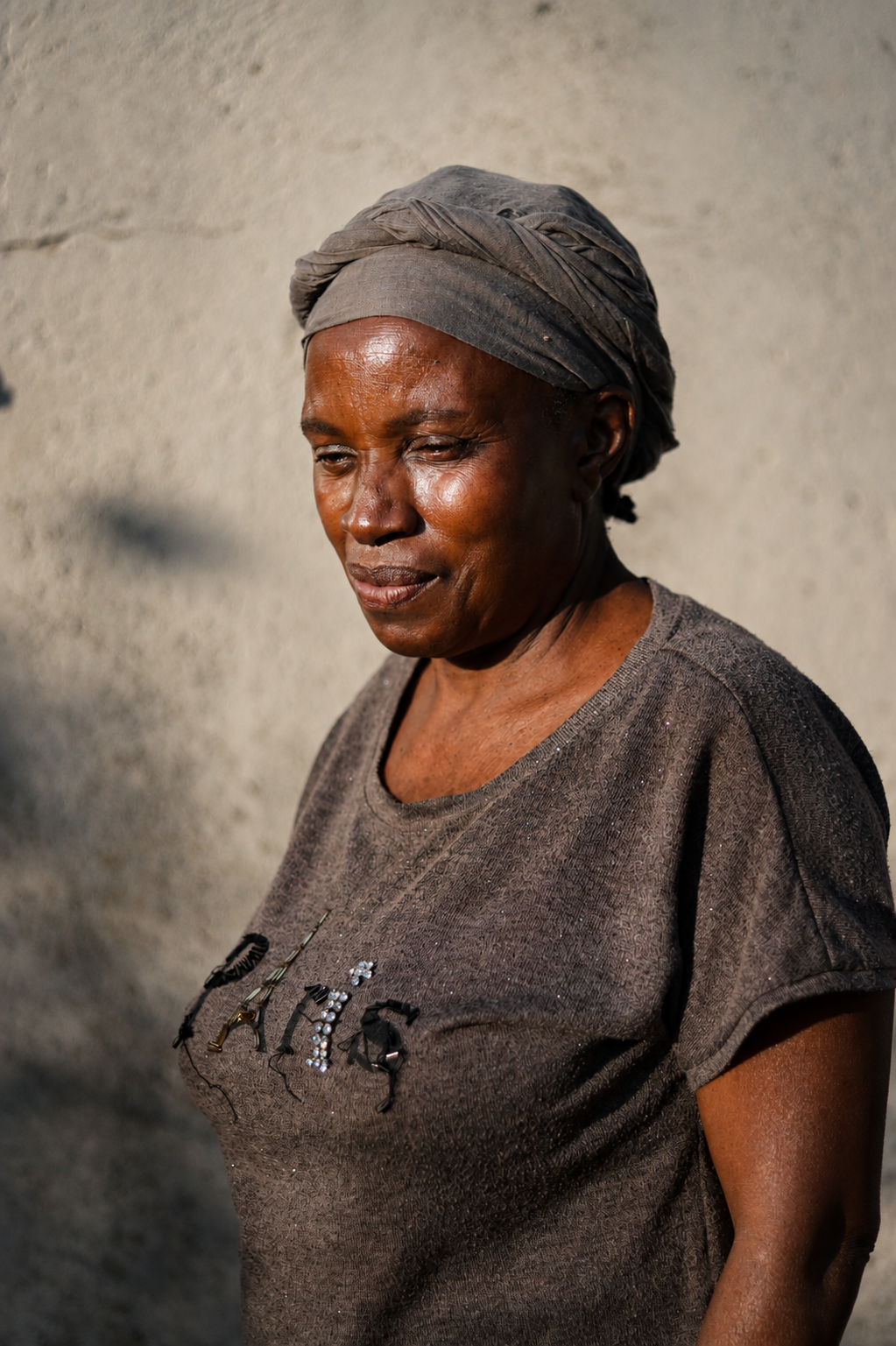 A portrait of Gertrude outside her family home in Mufakose.