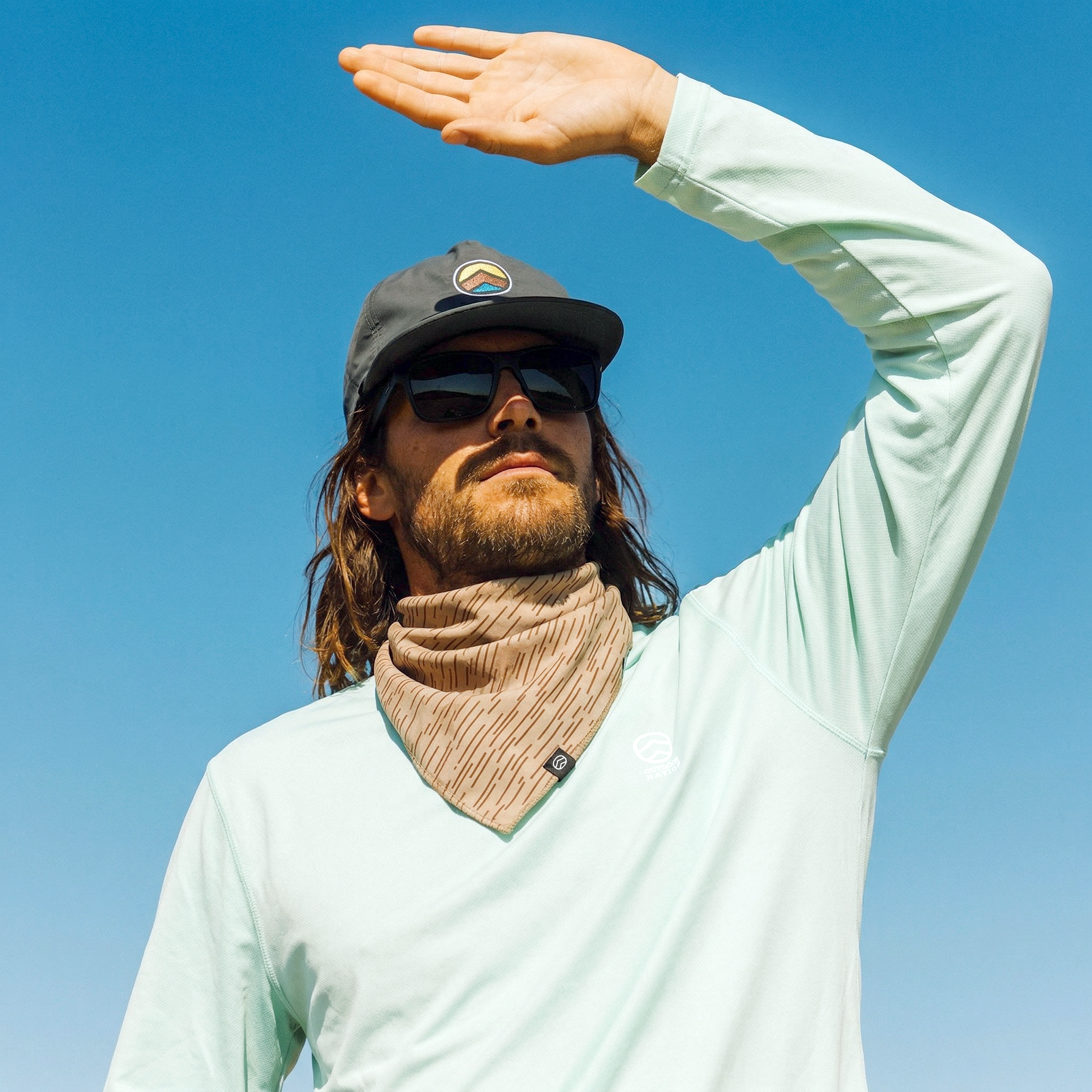 freepik_recreate-img1-but-replace-his-shirt-with-img2-replace-his-bandana-with-img3-and-replace-his-hat-with-img4-.-he-is-wearing-black-sunglasses_0001.png