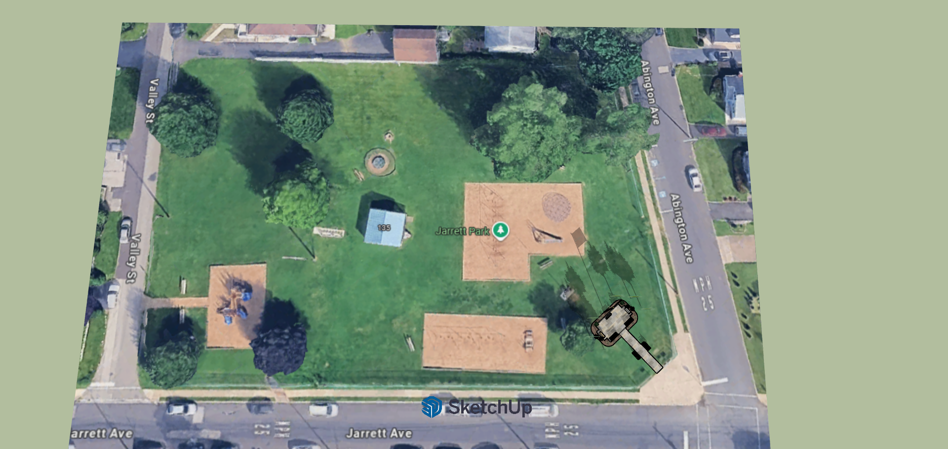 Aerial view of Jarrett Park, a grassy park with trees, playground, and sports courts, bordered by Vallet Street, Abbott Avenue, and Jarrett Avenue in a residential neighborhood.