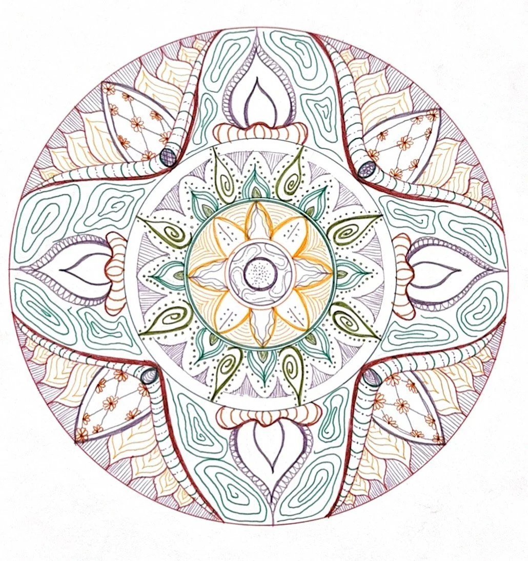 Hand-drawn circular mandala with leaf and petal patterns on white paper.