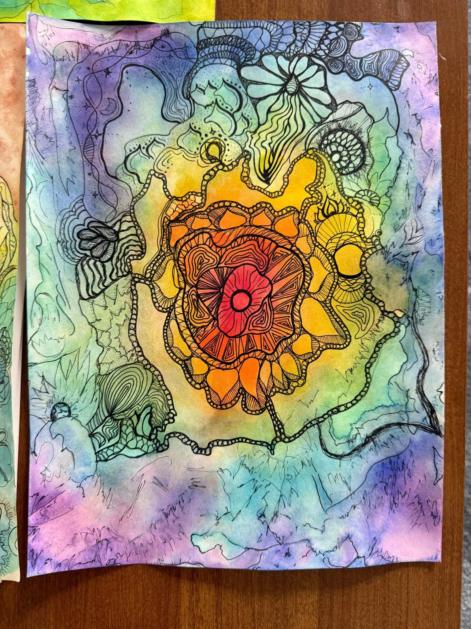 Colorful floral artwork with intricate black outlines over rainbow washes.