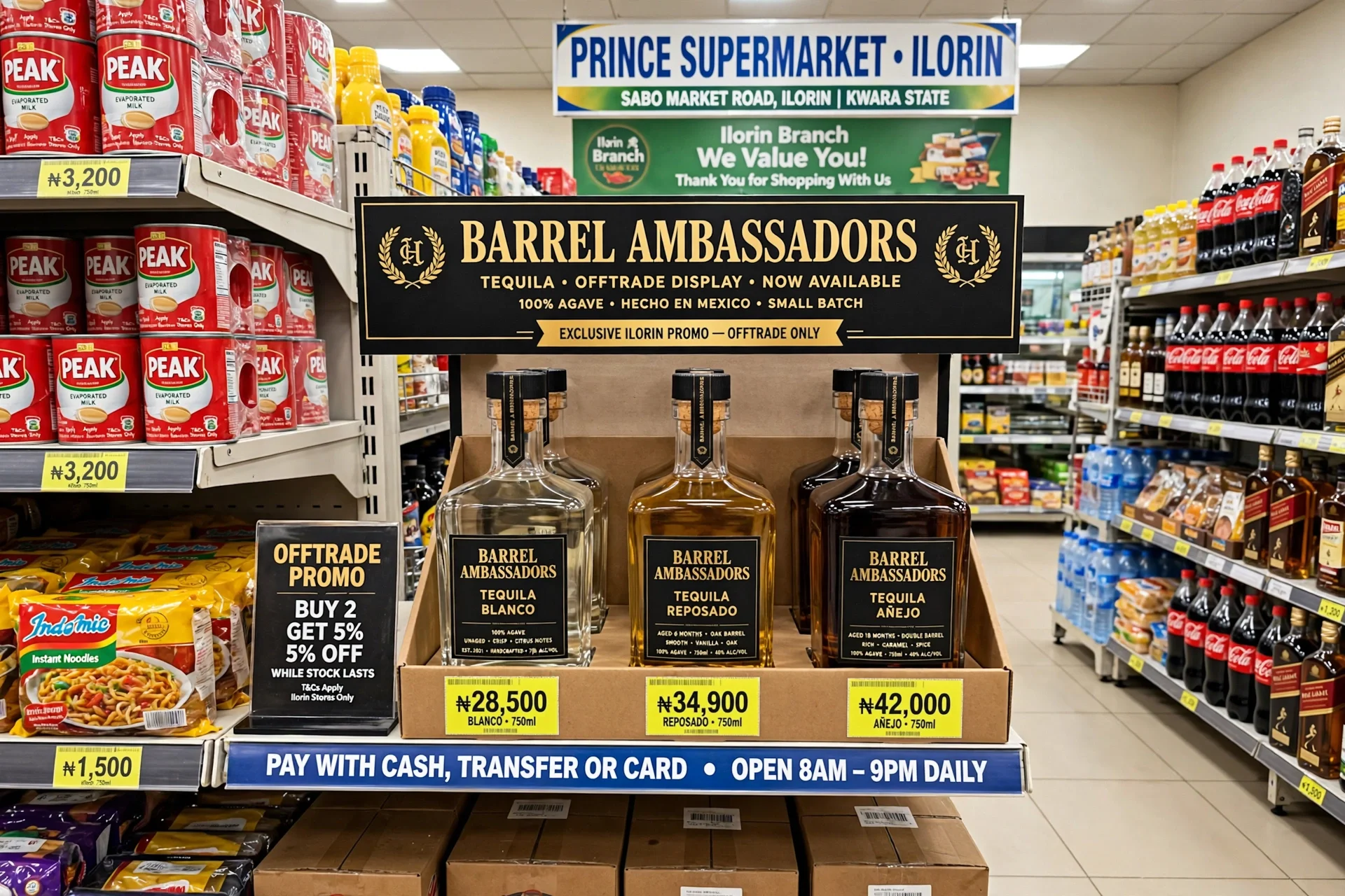 Display of barrels of tequila and promotional signage at Prince Supermarket in Ilorin, Nigeria, with shelves of products on both sides.