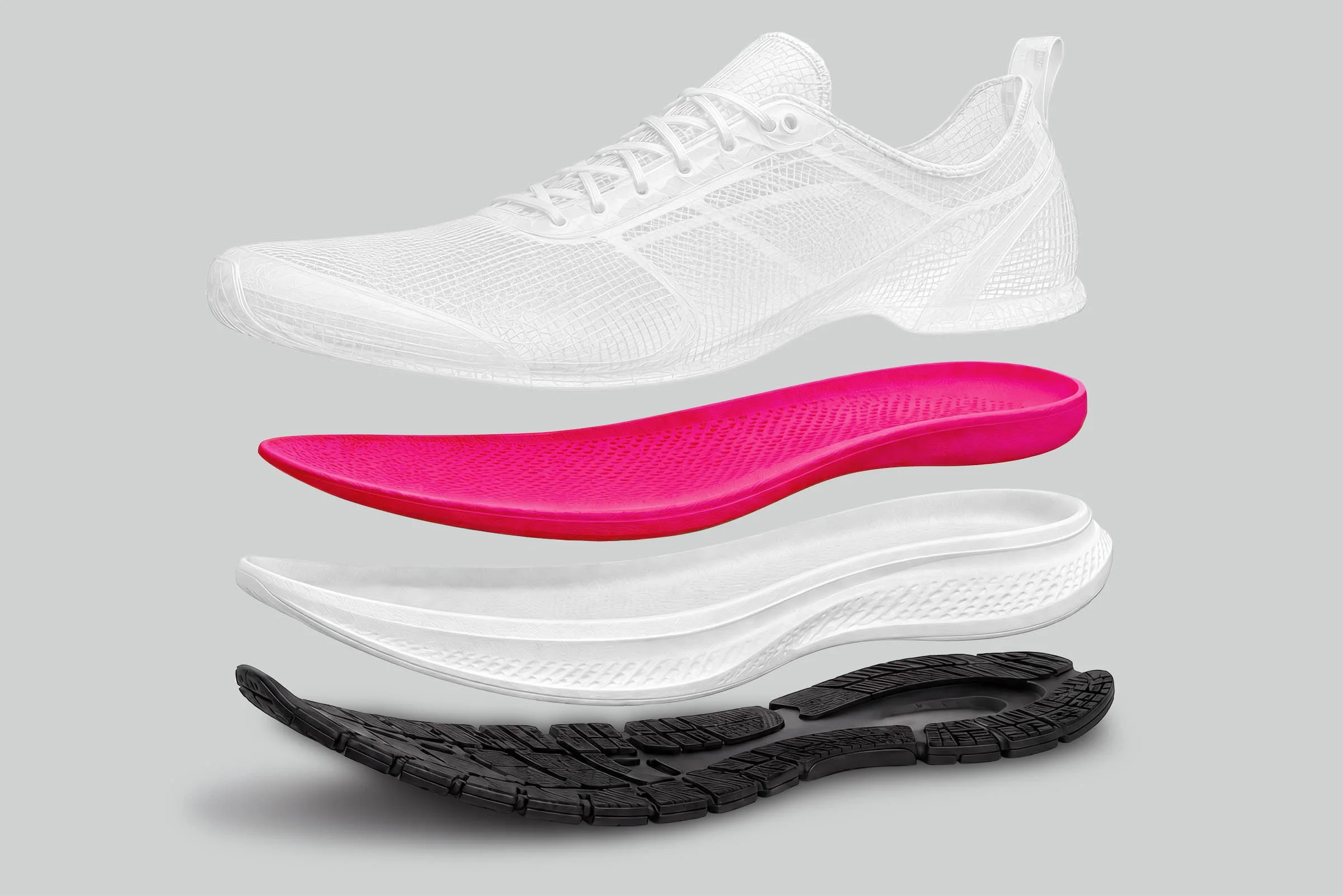 An exploded view of a running shoe with its sole and internal components separated, displaying different layers including the tread, midsole, and inner cushioning.