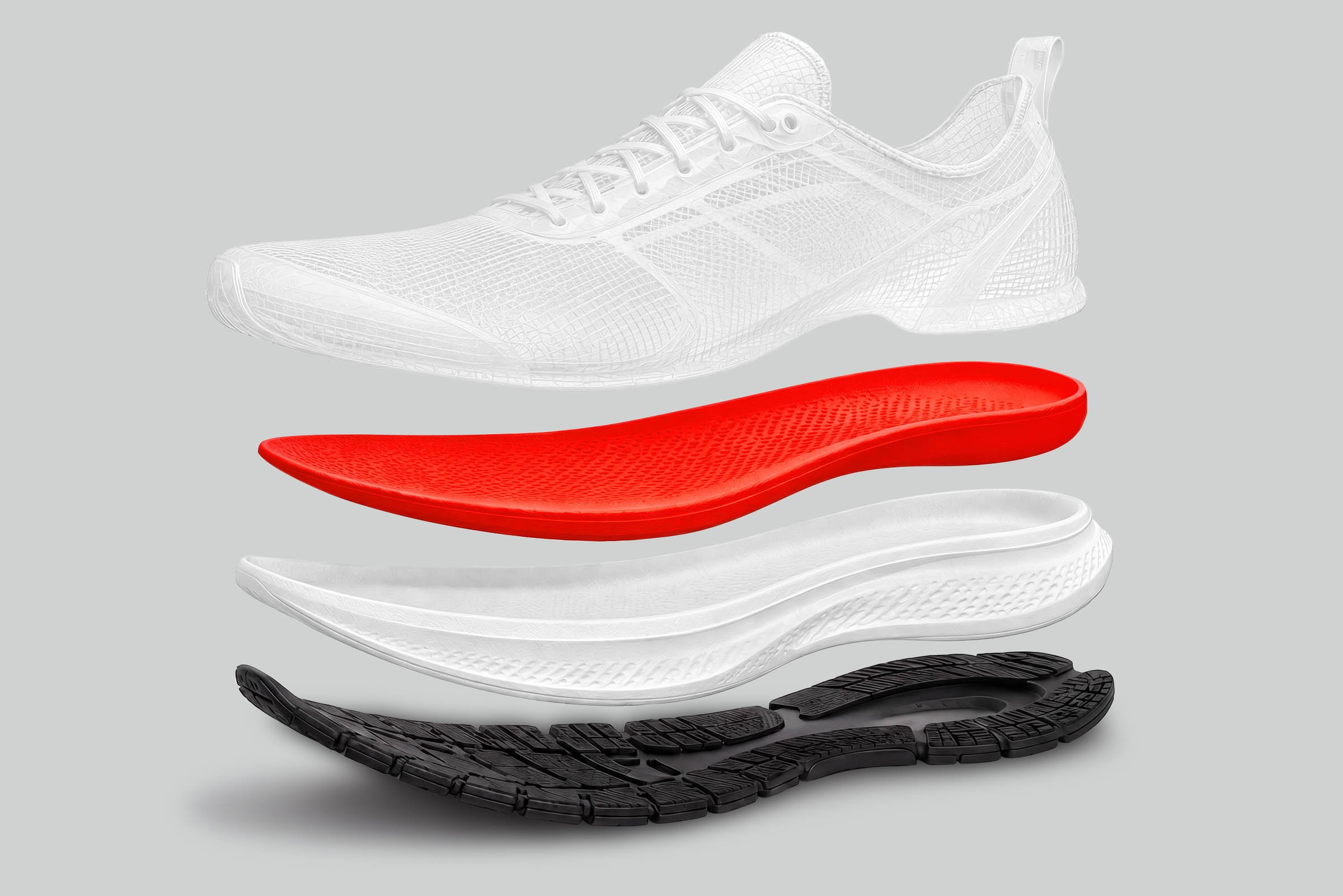 An exploded view of a running shoe with its sole and internal components separated, displaying different layers including the tread, midsole, and inner cushioning.
