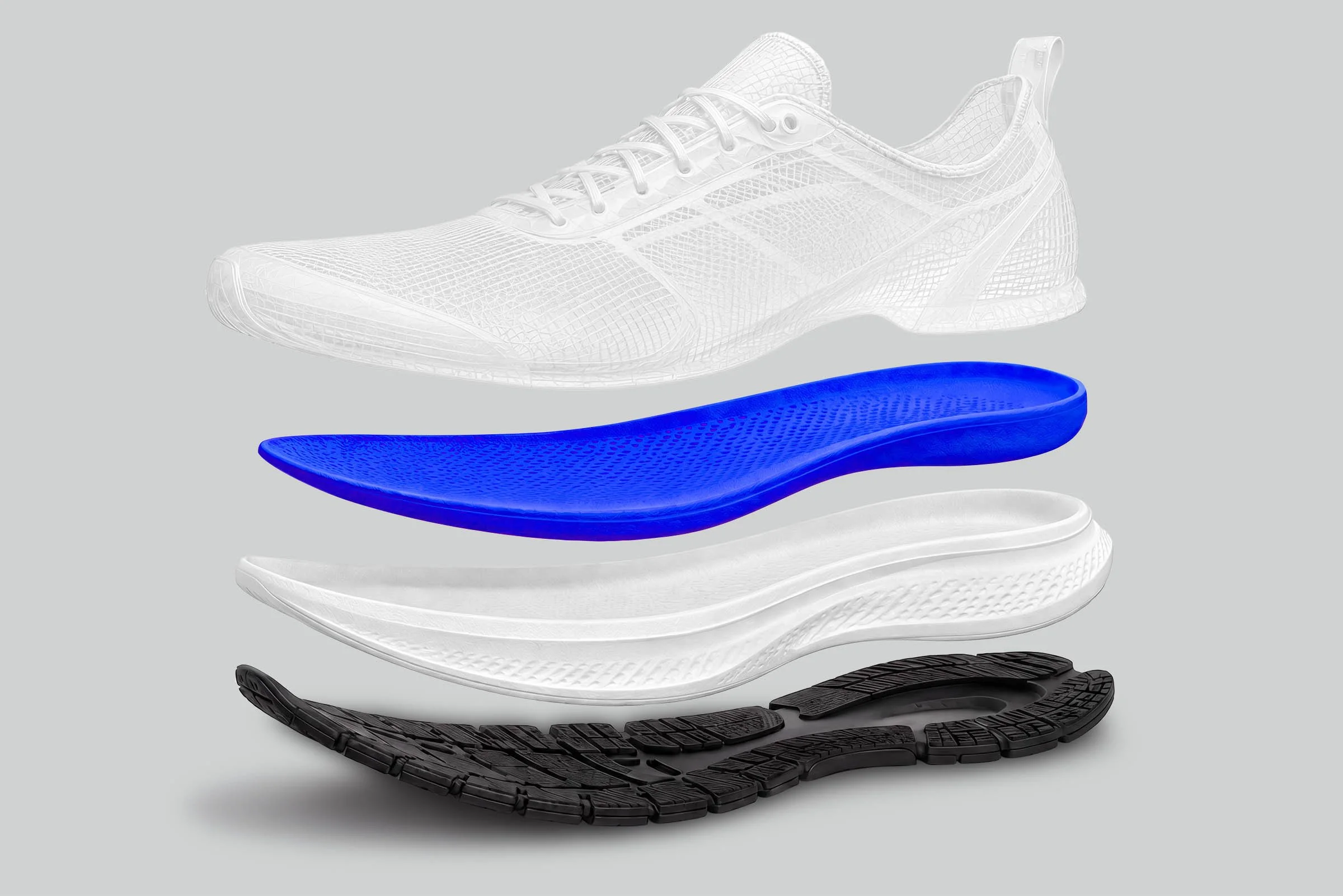 An exploded view of a running shoe with its sole and internal components separated, displaying different layers including the tread, midsole, and inner cushioning.