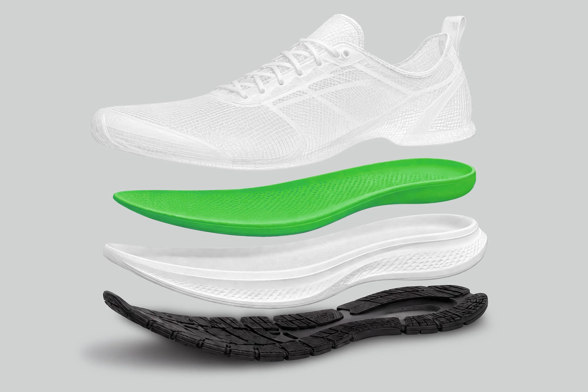 An exploded view of a running shoe with its sole and internal components separated, displaying different layers including the tread, midsole, and inner cushioning.