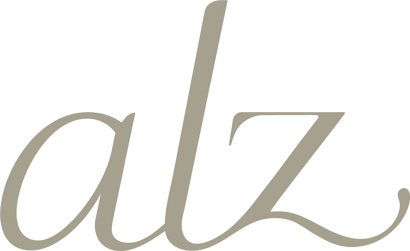 Logo avec le mot 'olz' écrit en lettres cursives grises sur fond noir.