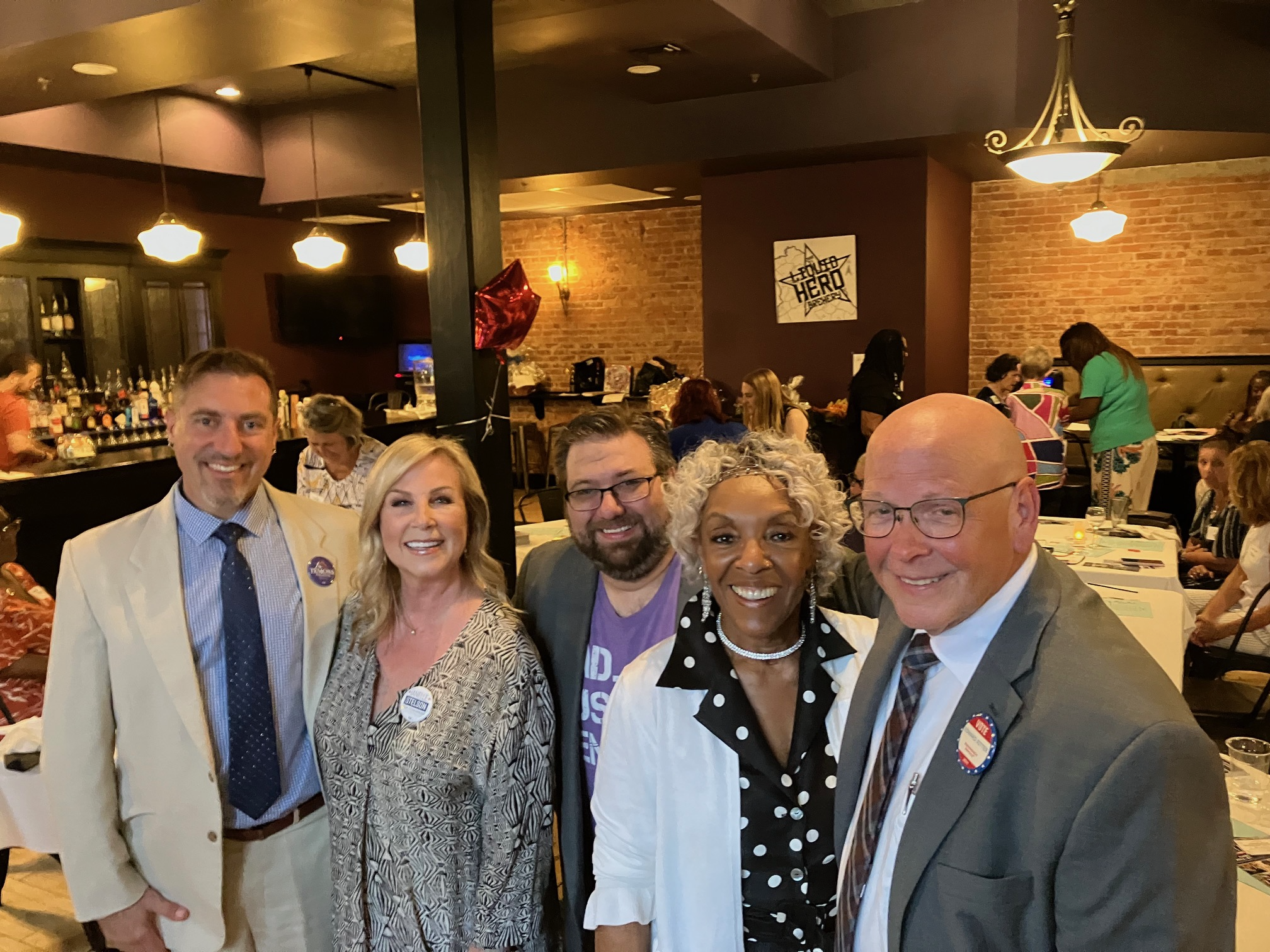 Edward Ritter posing with other Democratic candidates including Carol Hill Evans and Janelle Stelson.