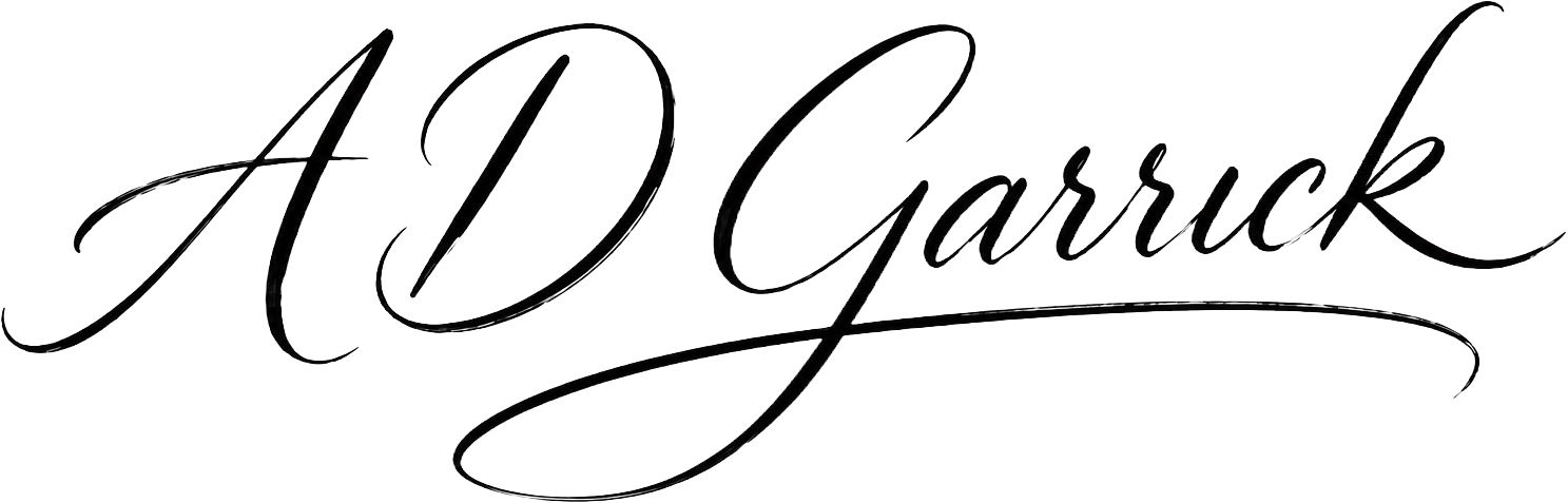 Elegant black cursive signature reading 'A D Garrick'.